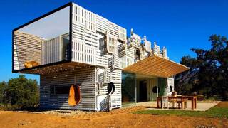 Дом из поддонов Дом из поддонов